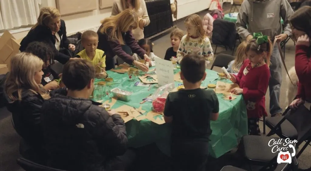 Group of adults and kids playing games